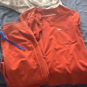 Burnt Orange Scrub Set from figs with V-Neck Top and jogger pants